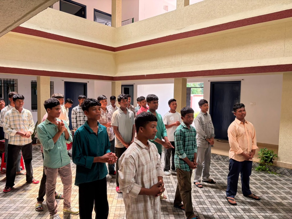 Morning Assembly & Community Prayer — Courtyard